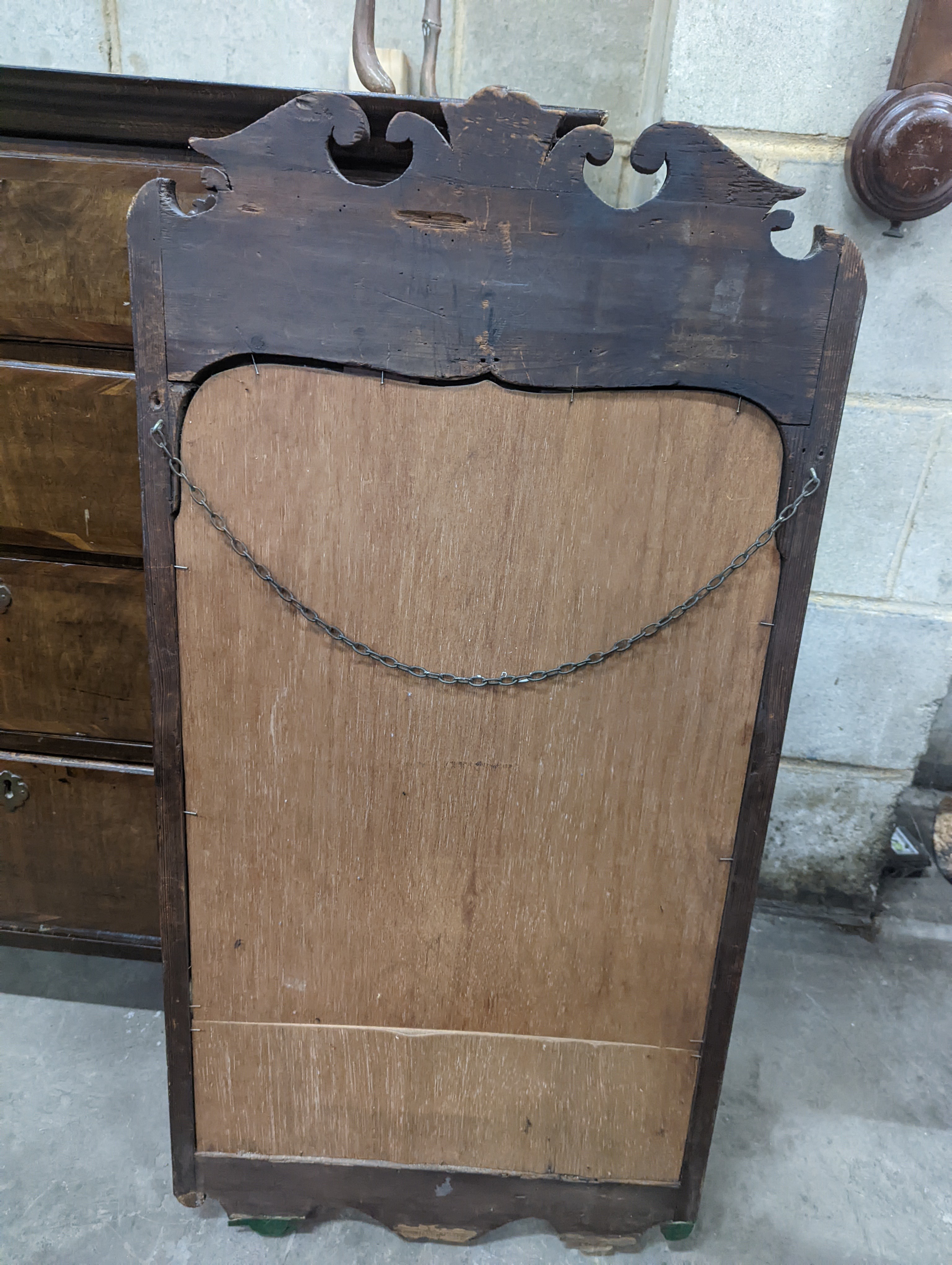 An 18th century walnut fret cut wall mirror, width 48cm, height 96cm